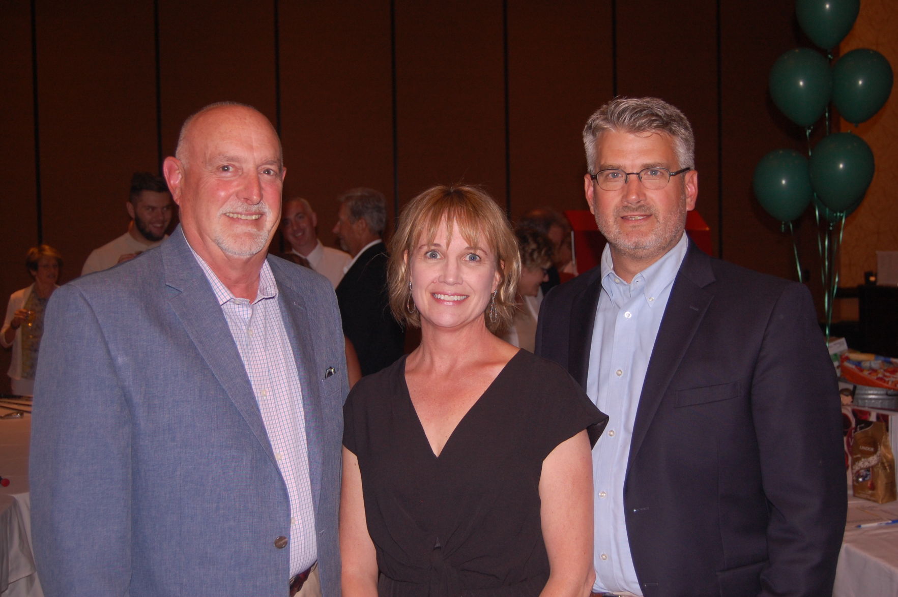 Chairperson Thom Jones, Julie and Duane Otto
